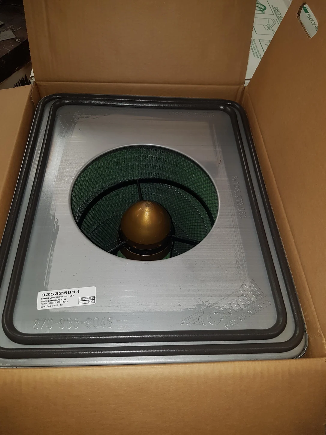 Replacement filter cartridge in its box before installation