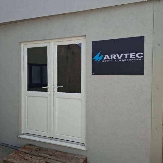 Harvtec workshop entrance with exterior sign