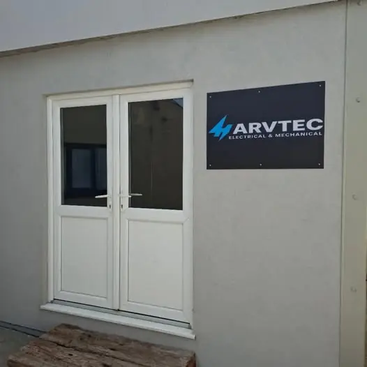 Harvtec workshop entrance with exterior sign